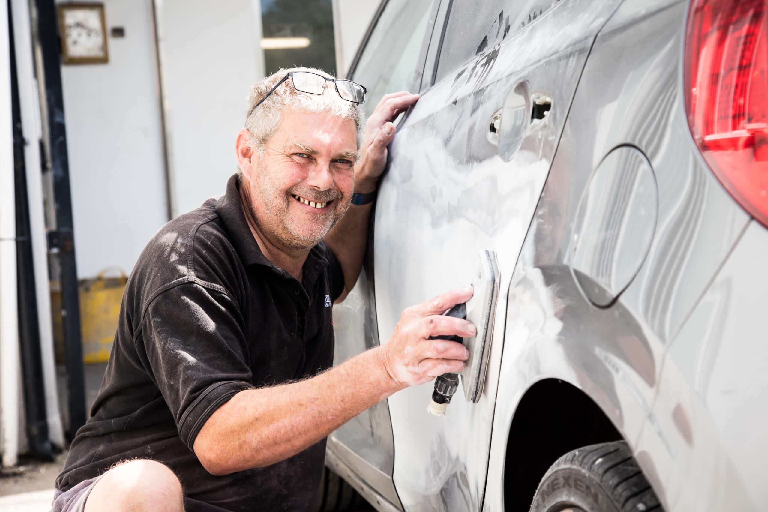 employee working on car